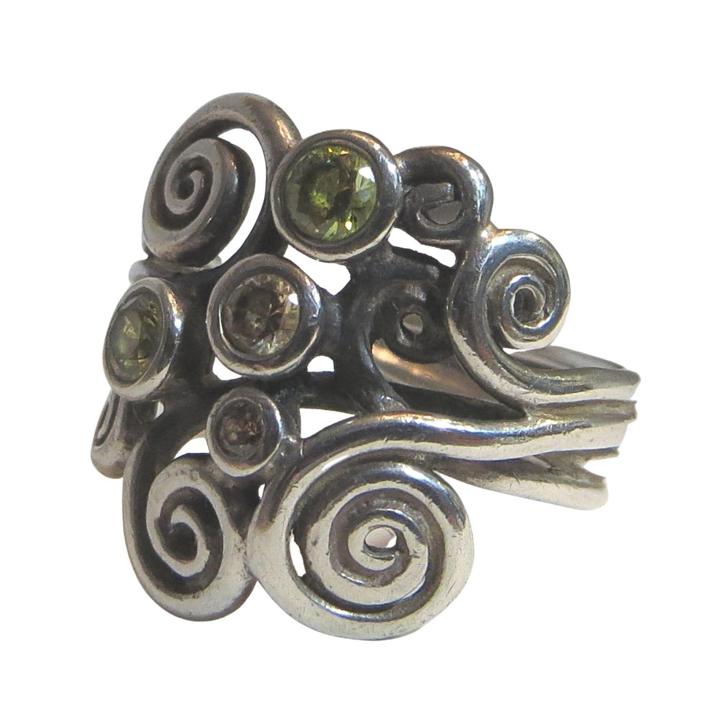 Pandora 190203CZP AUTUMN WIND Sterling Silver and CZ Ring.  Clear and green faceted CZs sit atop swirls of sterling.