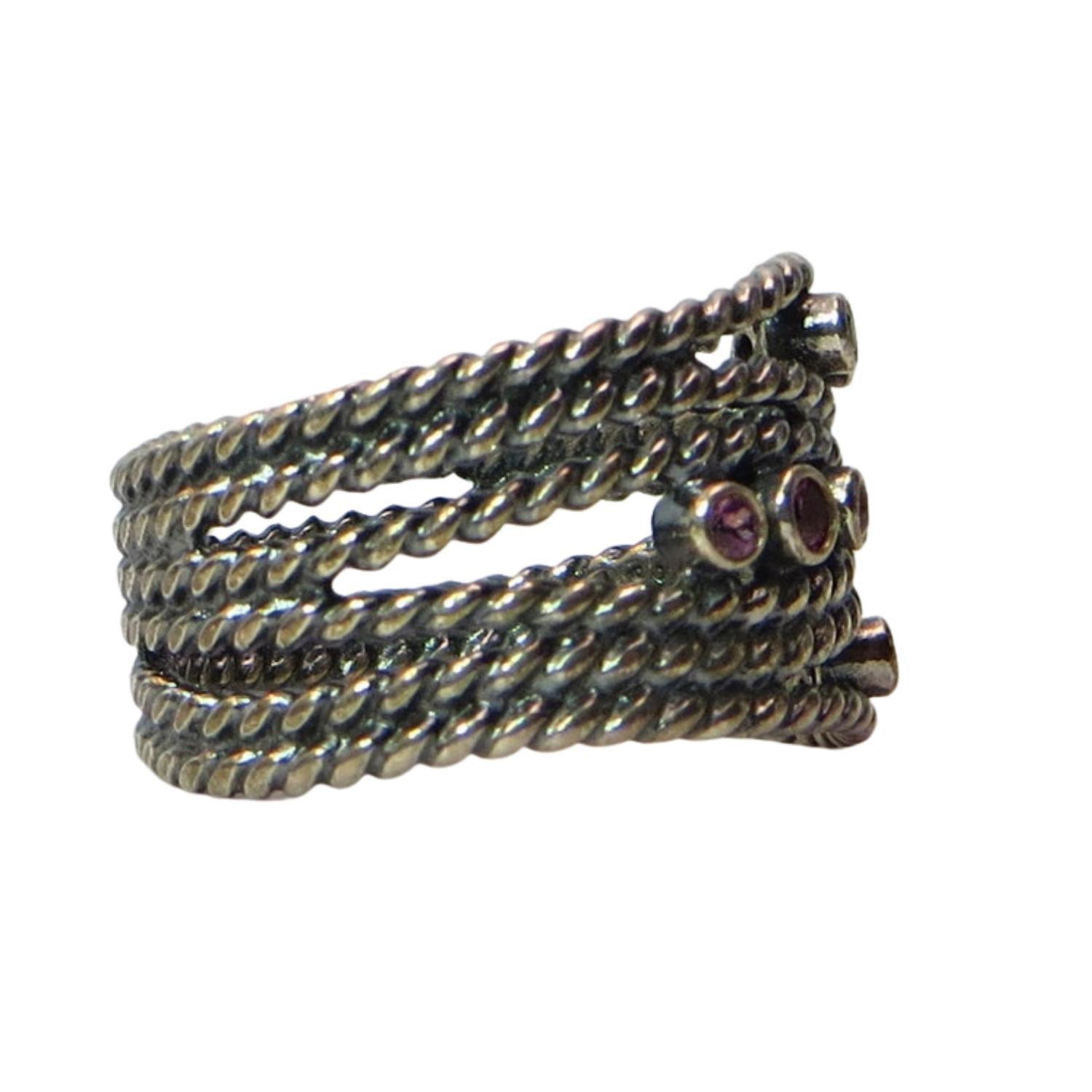 Pandora 190863RHL HIDDEN ROMANCE RHODOLITE Sterling Silver and Rhodolite Stacking Ring.  Ribbed bands of oxidized sterling mesh together and topped with light pink faceted rhodolite stones.