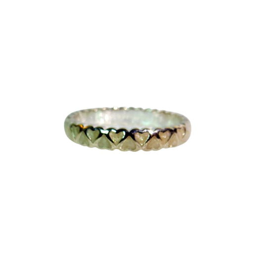 Pandora 190975EN23 ABUNDANCE OF LOVE Enamel and Sterling Silver Stacking Ring.  A medium width stacking band with creamy white enamel hearts set in sterling.